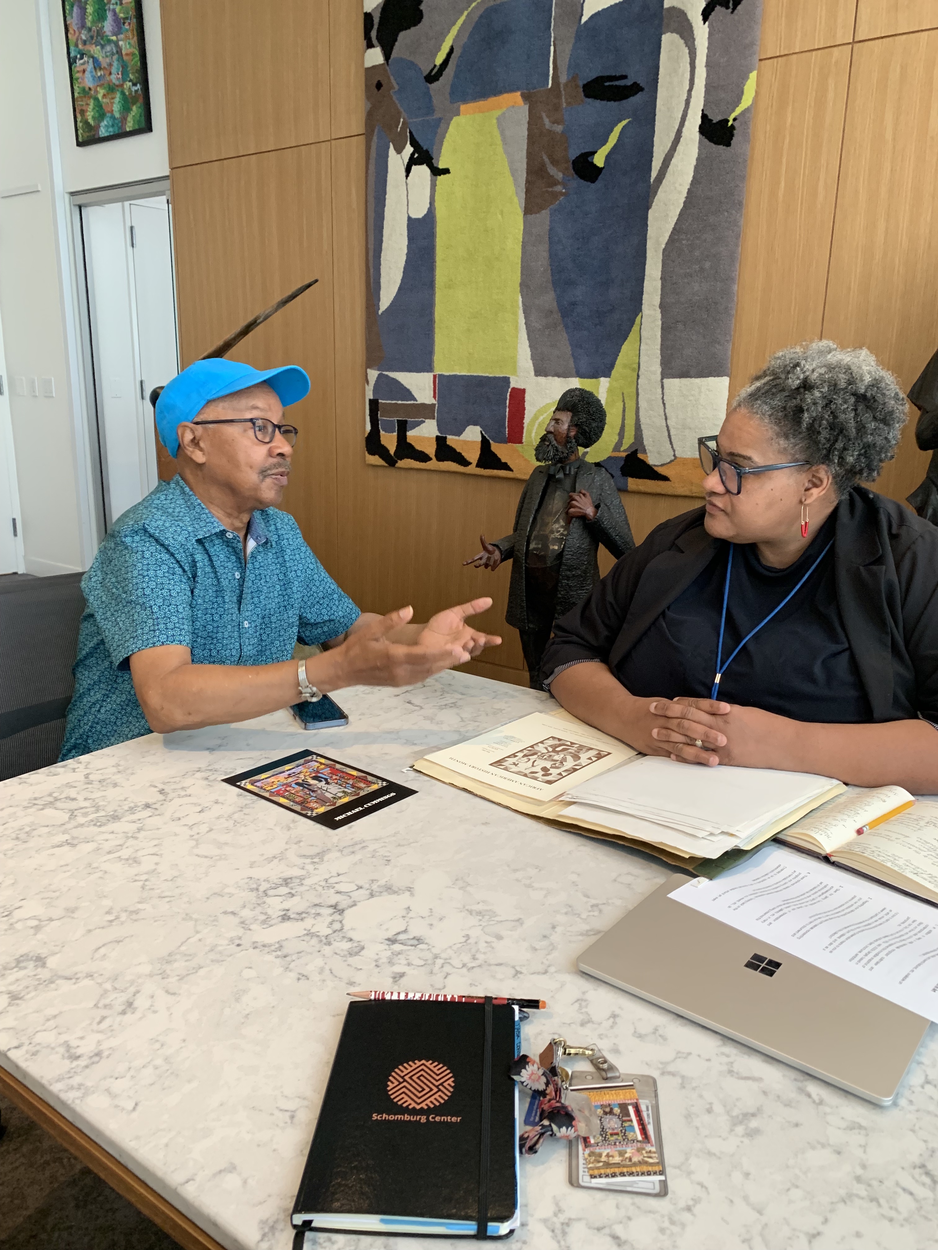 Photograph of Michael A. Cummings and Tammi Lawson, Curator of Art & Artifacts Division, Schomburg Center for Research in Black Culture 