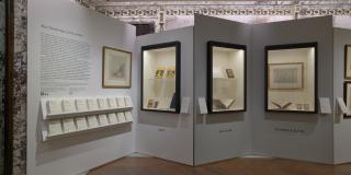 Photograph of exhibition showing one side of the gallery corridor