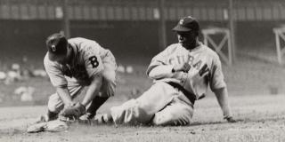 1940, American Negro League Baseball team, NY Cubans player sliding into a base, during a game against the Newark Eagles - COPYRIGHT MORGAN and MARVIN SMITH