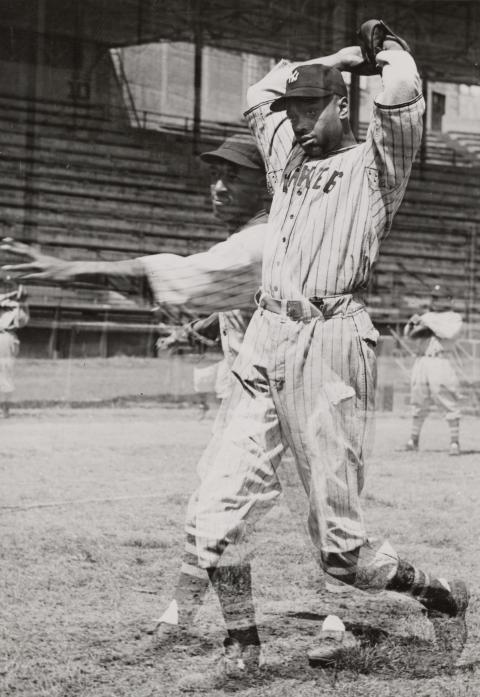 1930–1950, double exposure photograph of an American Negro League Baseball player throwing a baseball - COPYRIGHT MORGAN and MARVIN SMITH